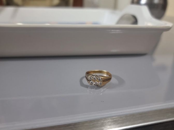 The phone photo it came from: the same ring on a counter tray